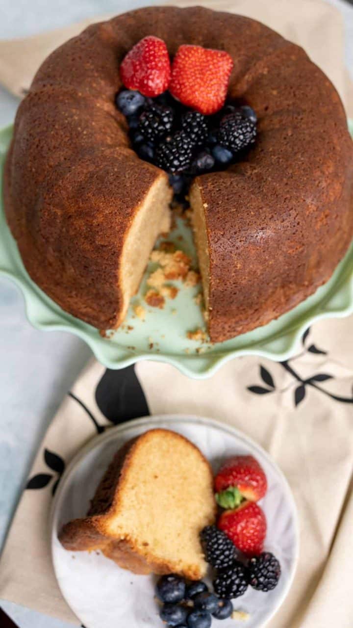 Cake on the cream cheese pound cake plate and a slice on the small plate.