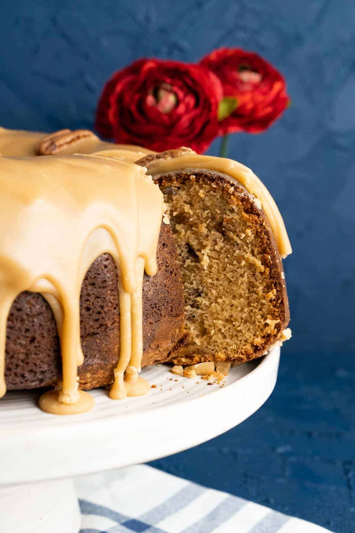 close up shot of one piece of southern praline pecan cake in a plate. 