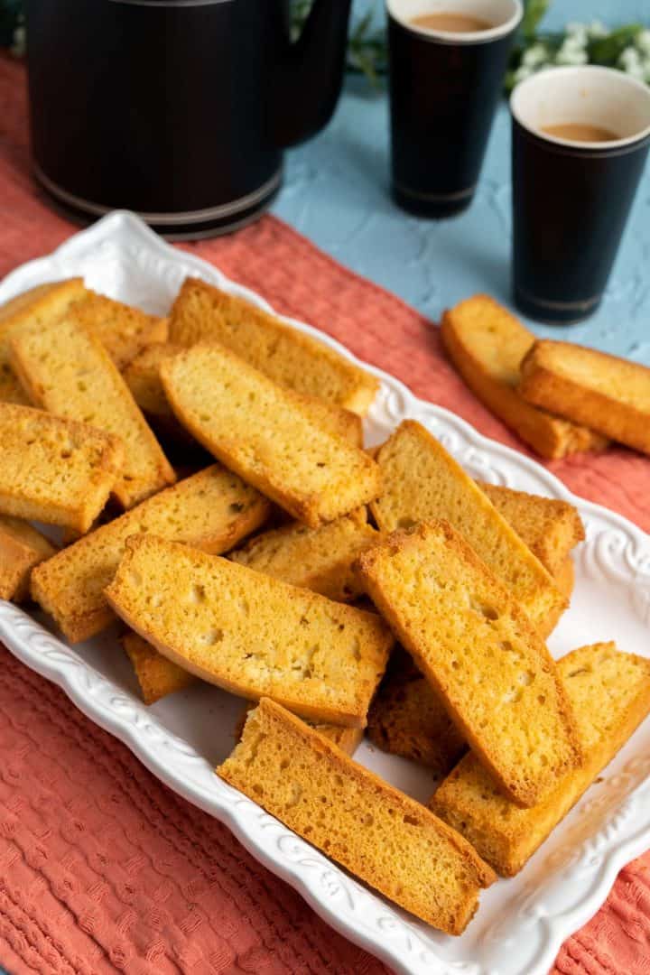 cake rusks on the red table cloth.