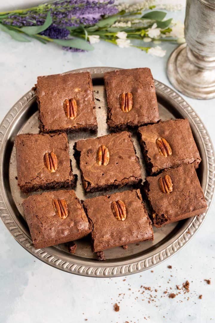 brownies over the top shot with crumbs around.