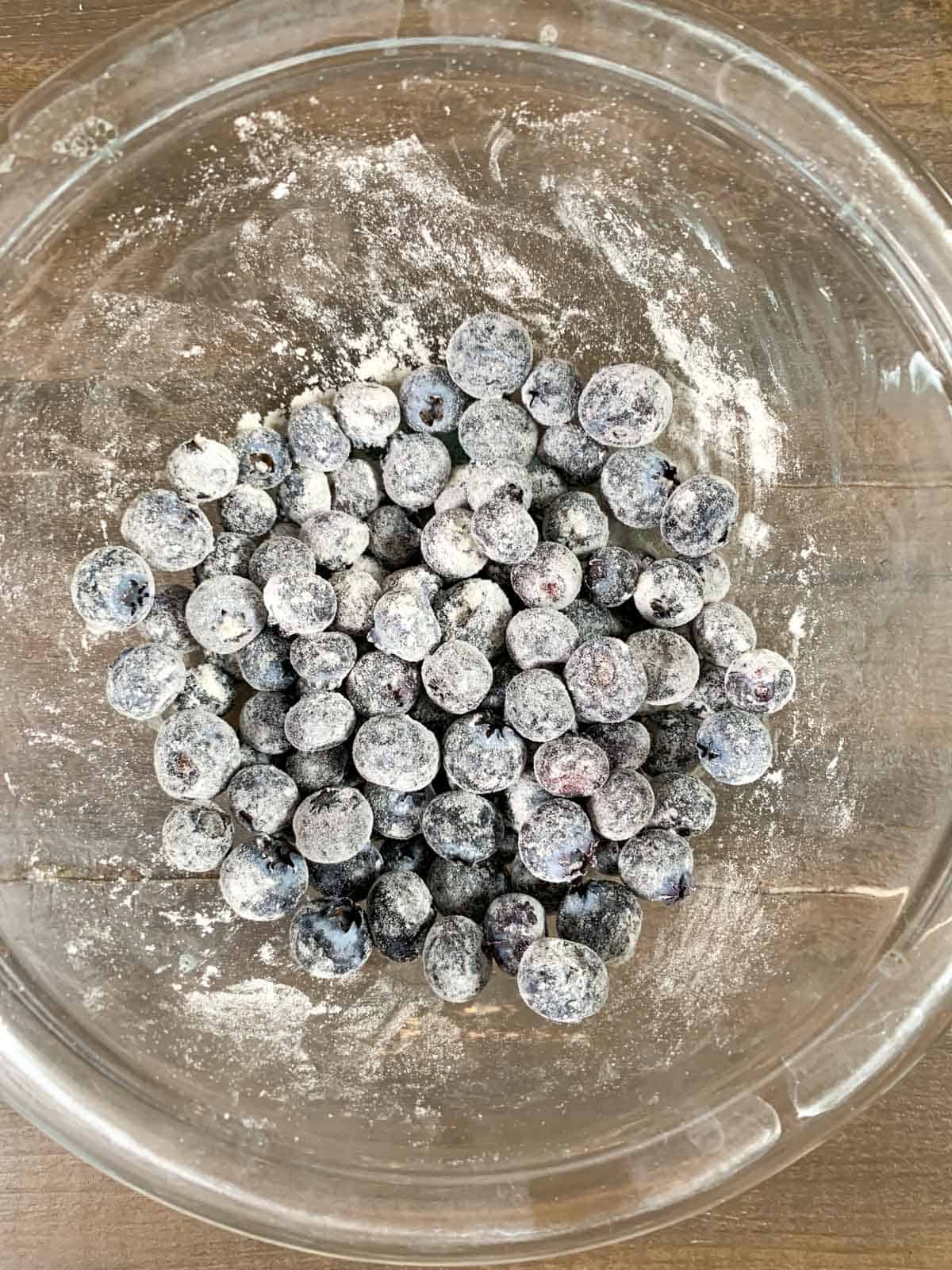 tossing the blueberries in a little bit of flour before adding to the batter.