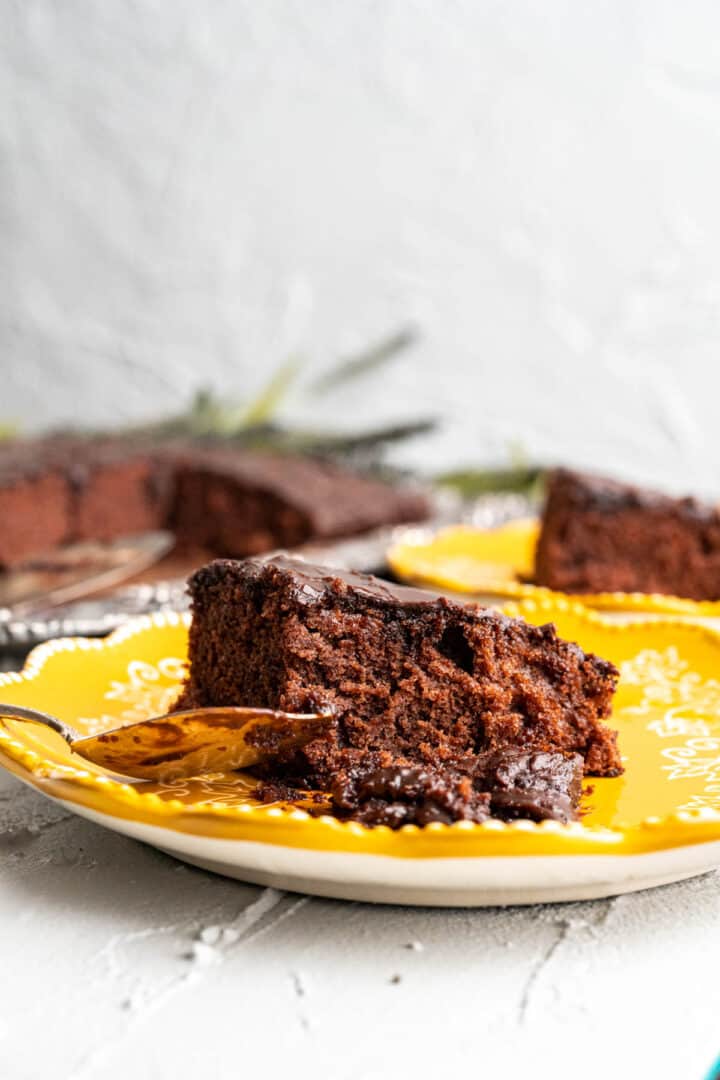 close shot of coke cake sitting in a yellow plate.