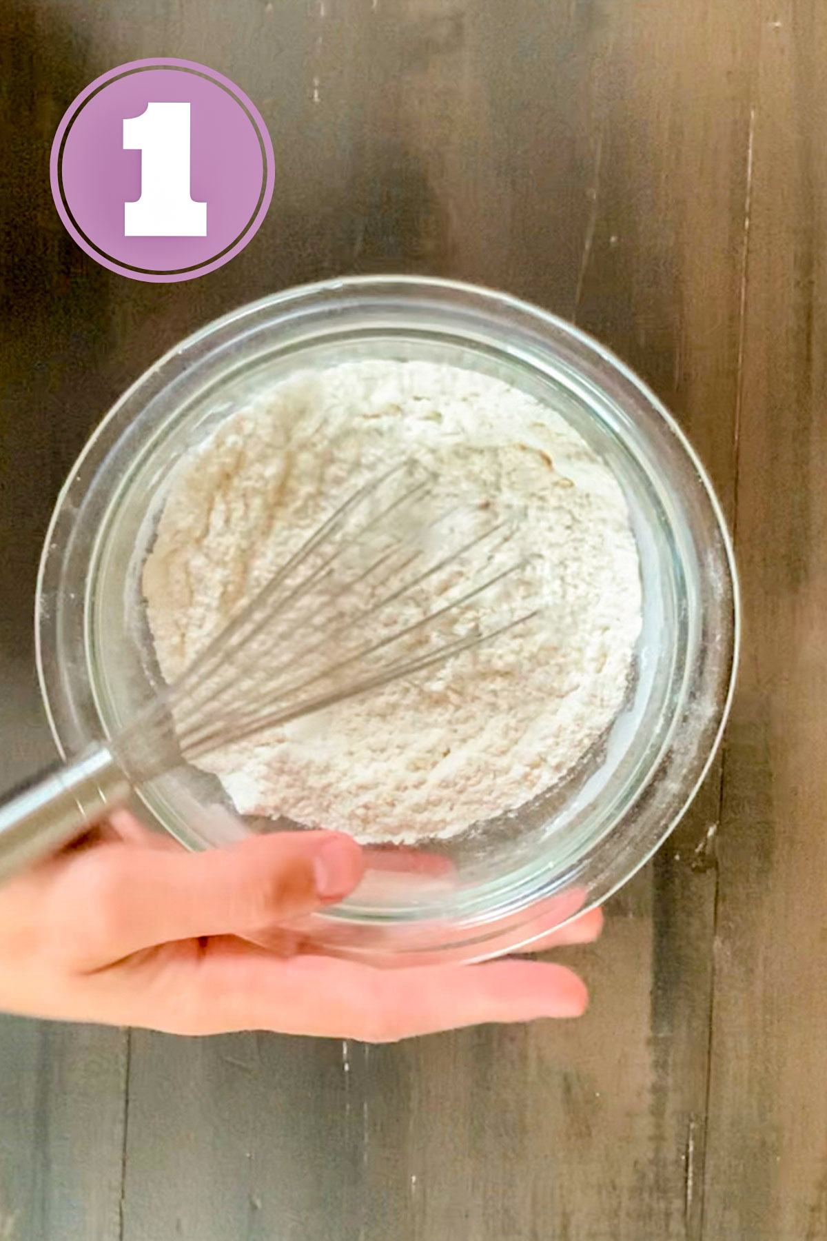 whisking the dry ingredients for lemon crinkle cookies.