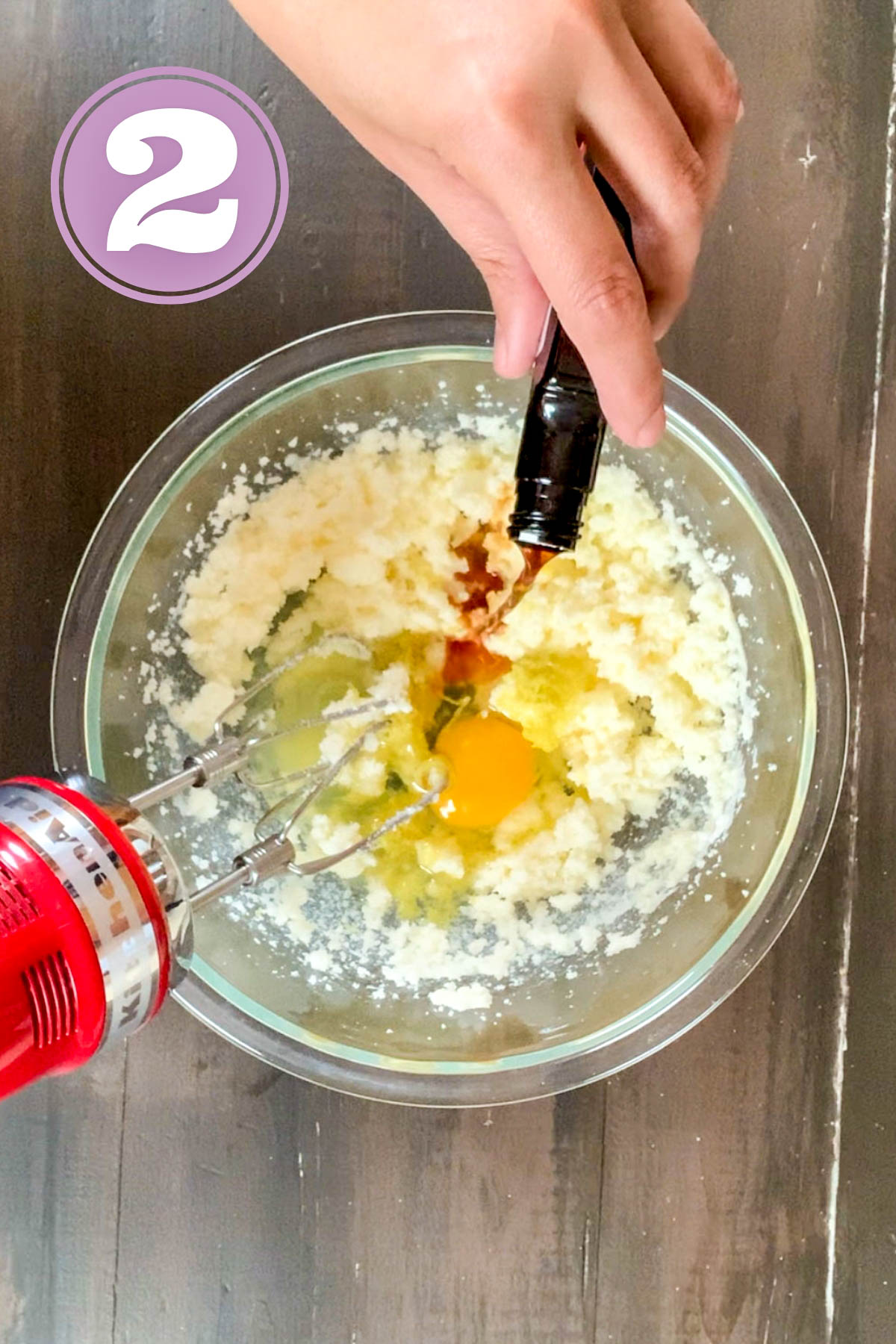 creaming the butter and sugar together with other ingredients in a bowl for lemon cookies.