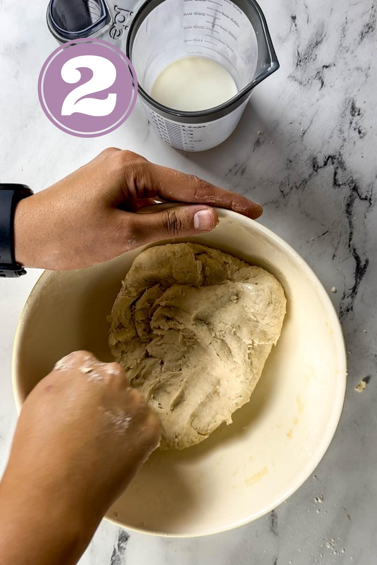 Kneaded turkish bread dough in a bowl.