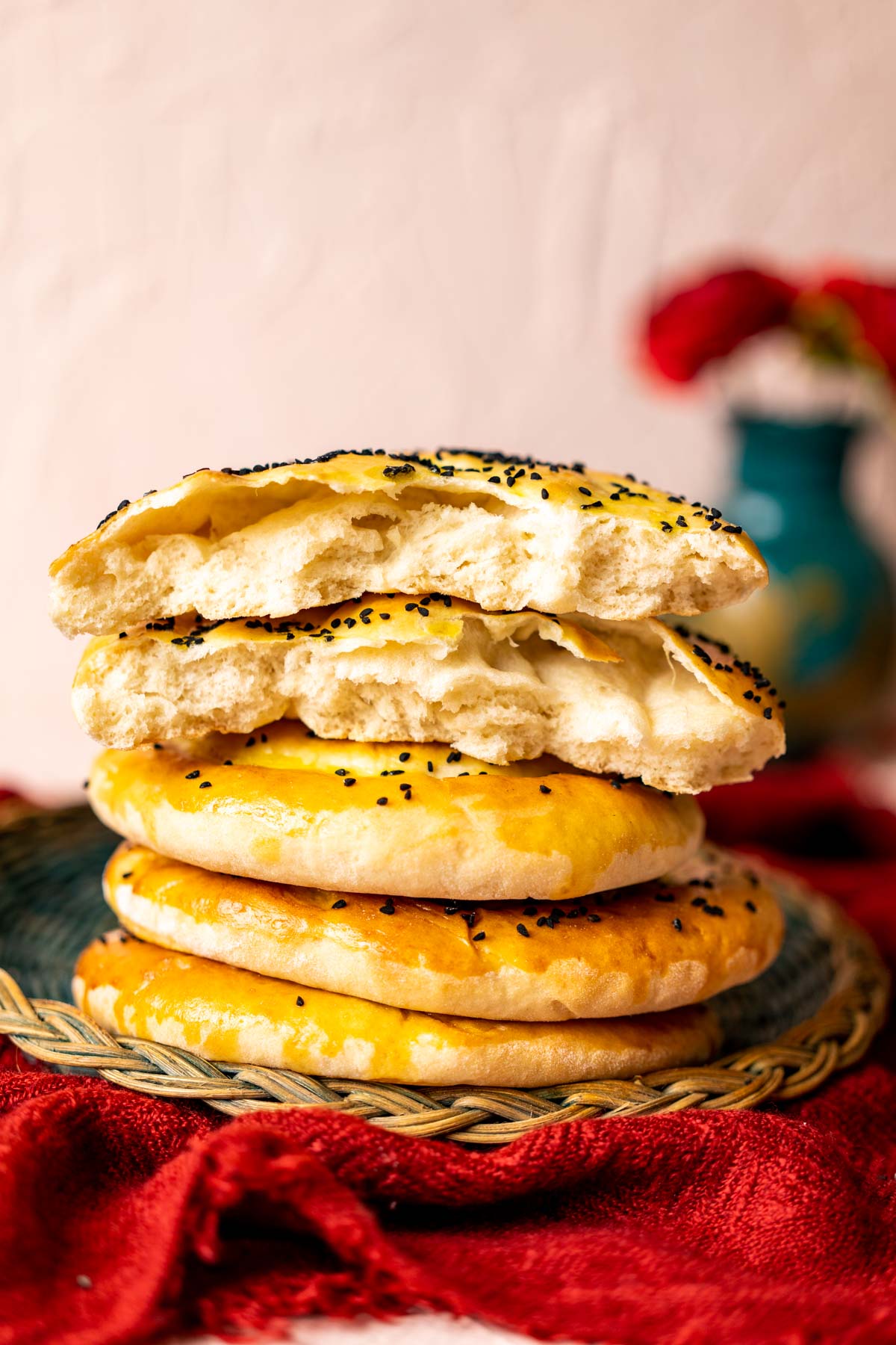 one turkish bread loaf cut in half showing the light and fluffy texture inside. 