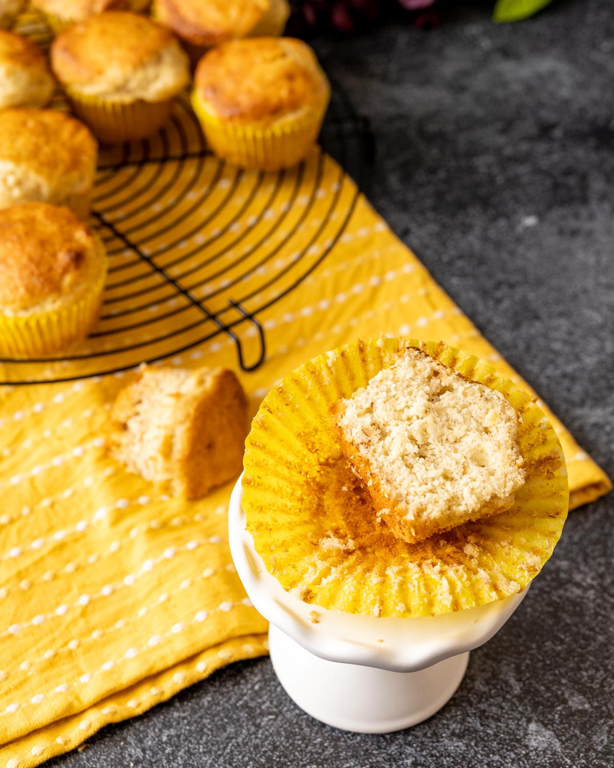 One bisquick muffin cut in half showing the texture and crumb.