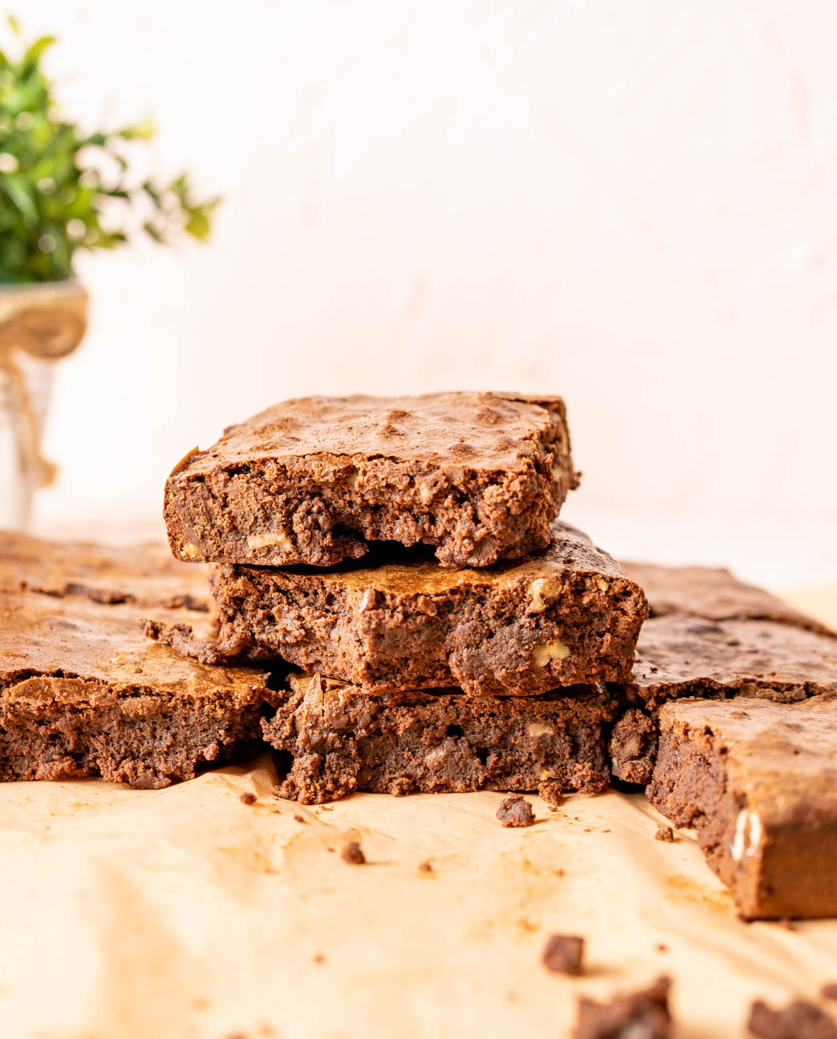 Three brownies overlapped and showing the texture inside. 