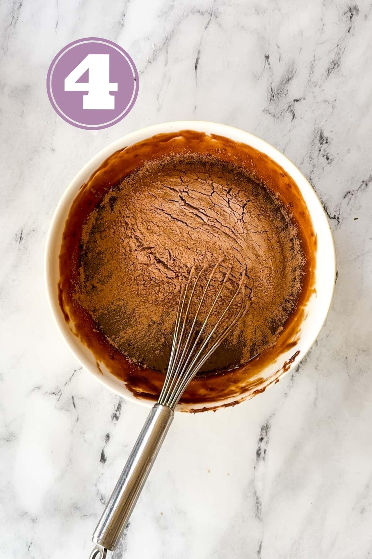 Adding cocoa powder and all-purpose flour in the condensed milk brownie batter.