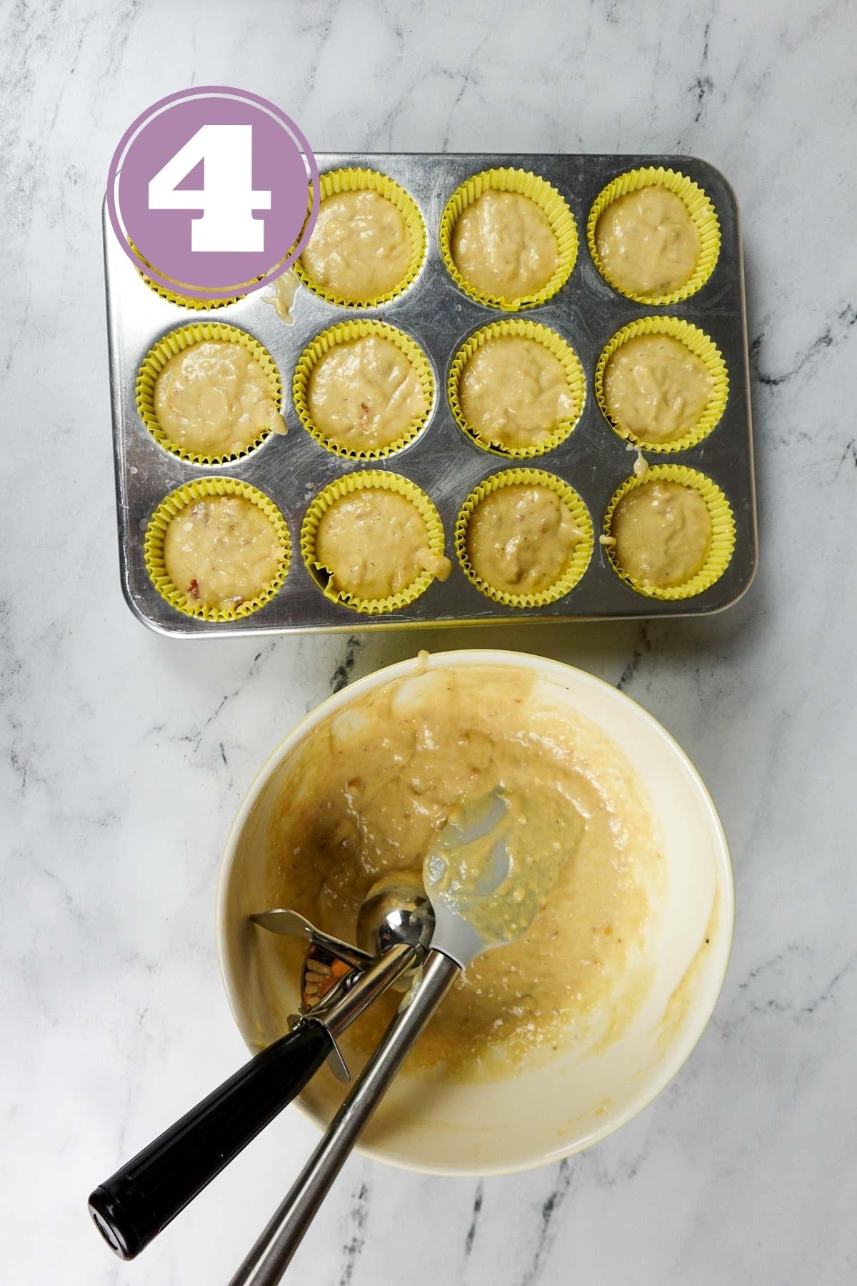 Filled banana muffins in the cupcake liners in the baking tray.