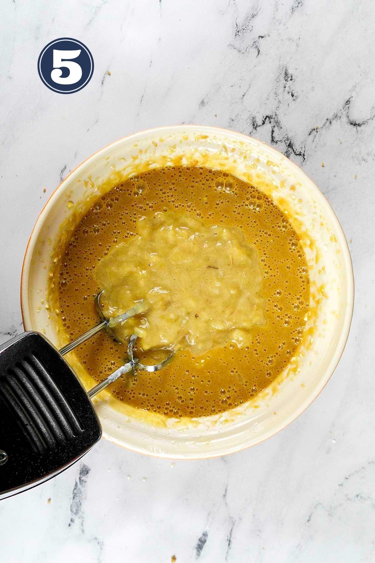 mashed bananas added to the banana chocolate chip bundt cake batter.