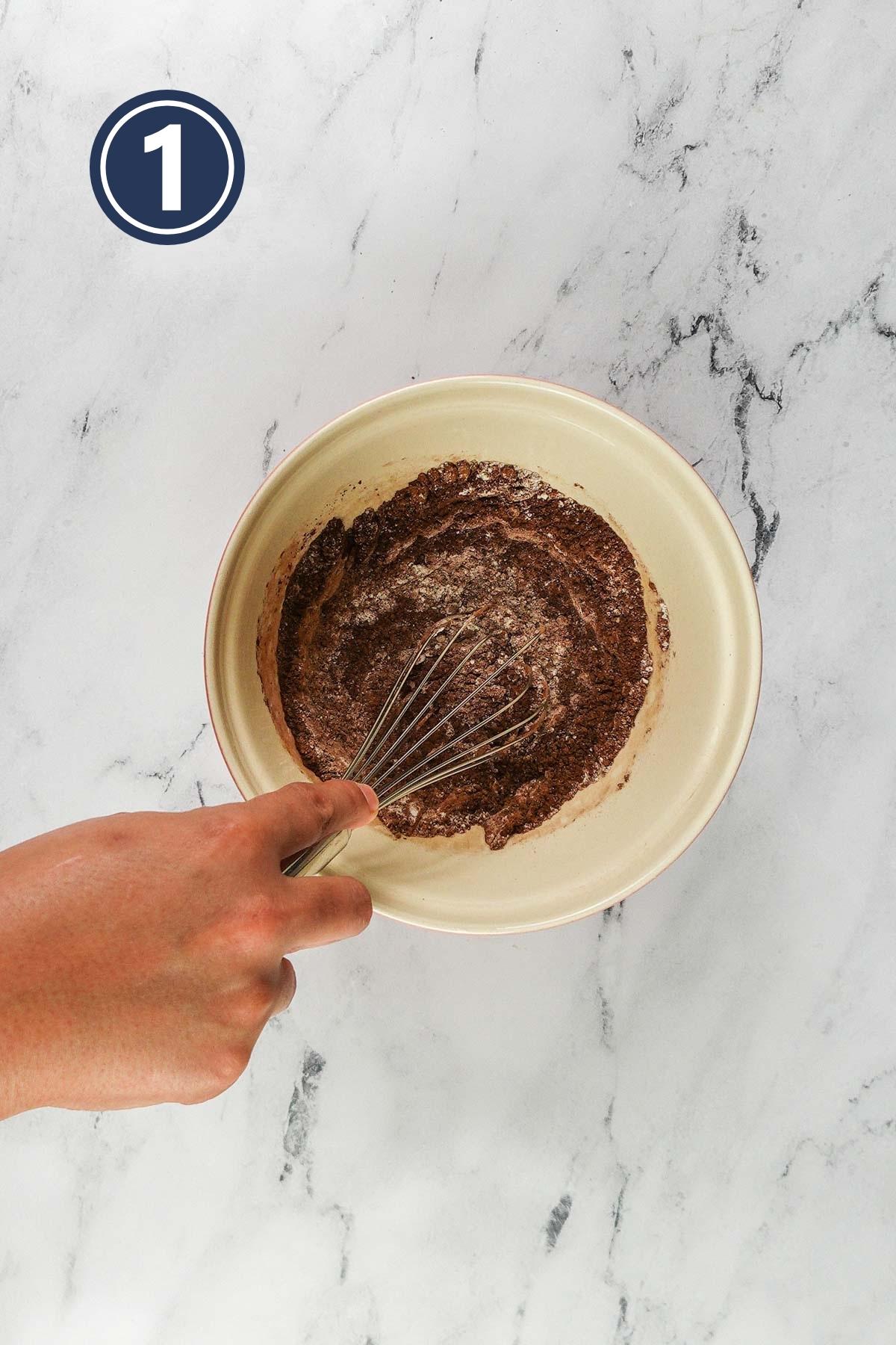 Whisking the all purpose flour, cocoa powder and salt together in a small bowl.