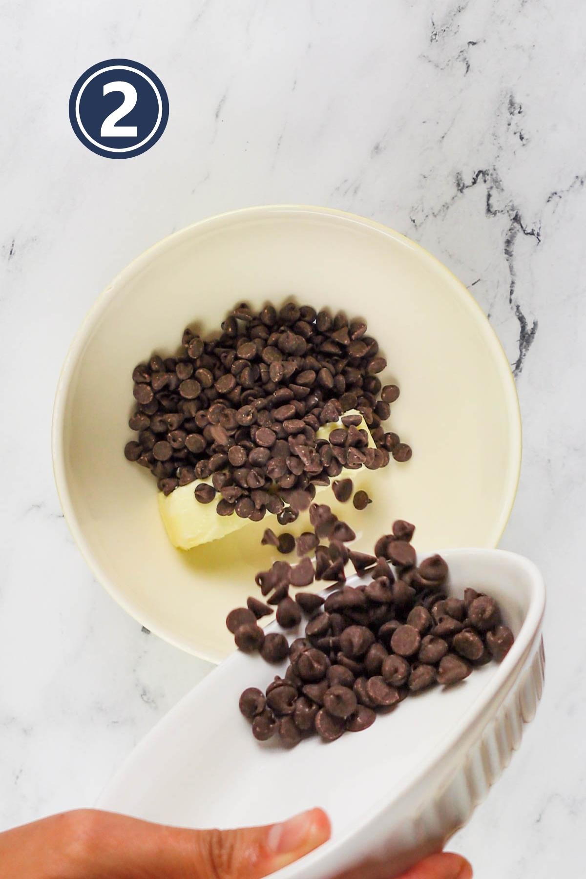 Adding the chocolate chips to the butter to melt for brownies.