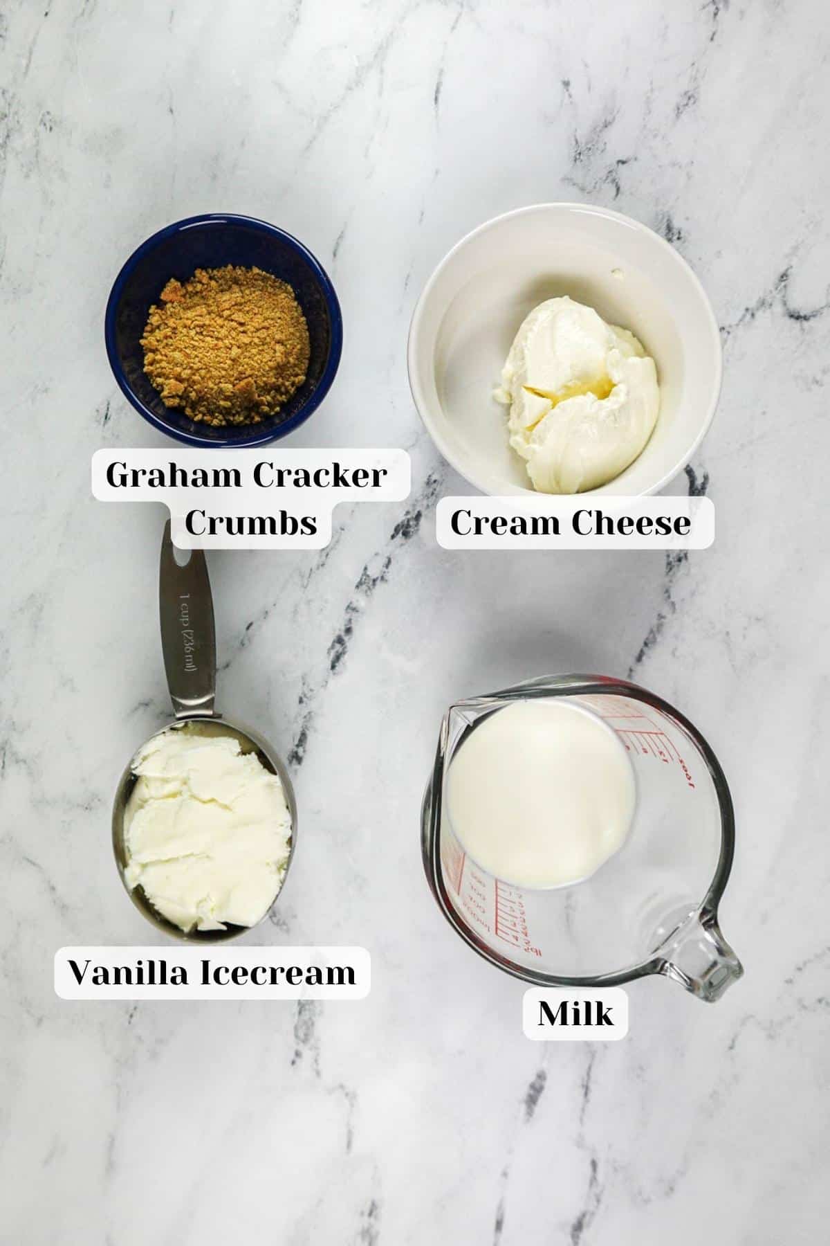 ingredients for cheesecake milkshake on a table.