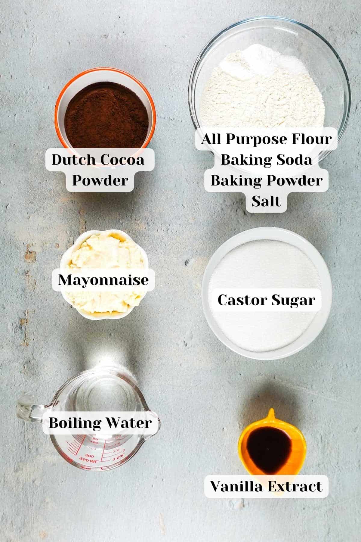 Ingredients for chocolate mayonnaise cake placed on the counter.