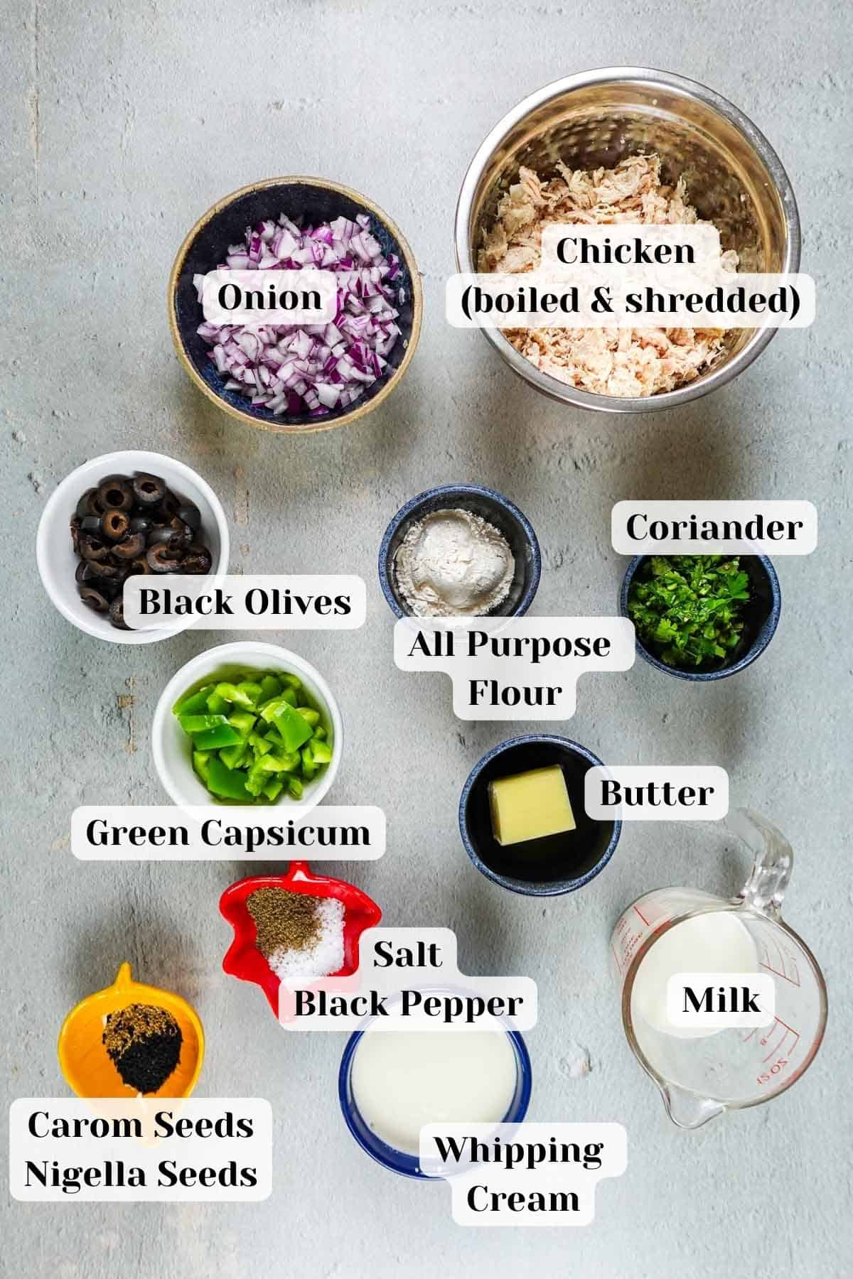 ingredients for chicken bread sitting on the table.