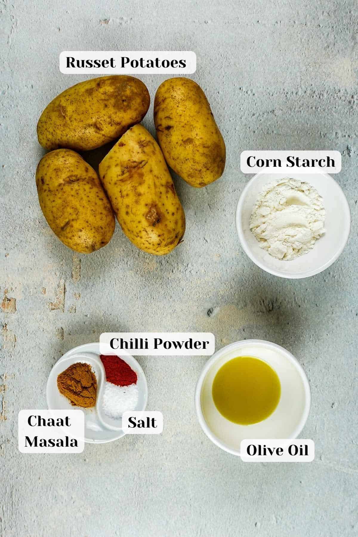 Ingredients for masala fries on the kitchen counter.