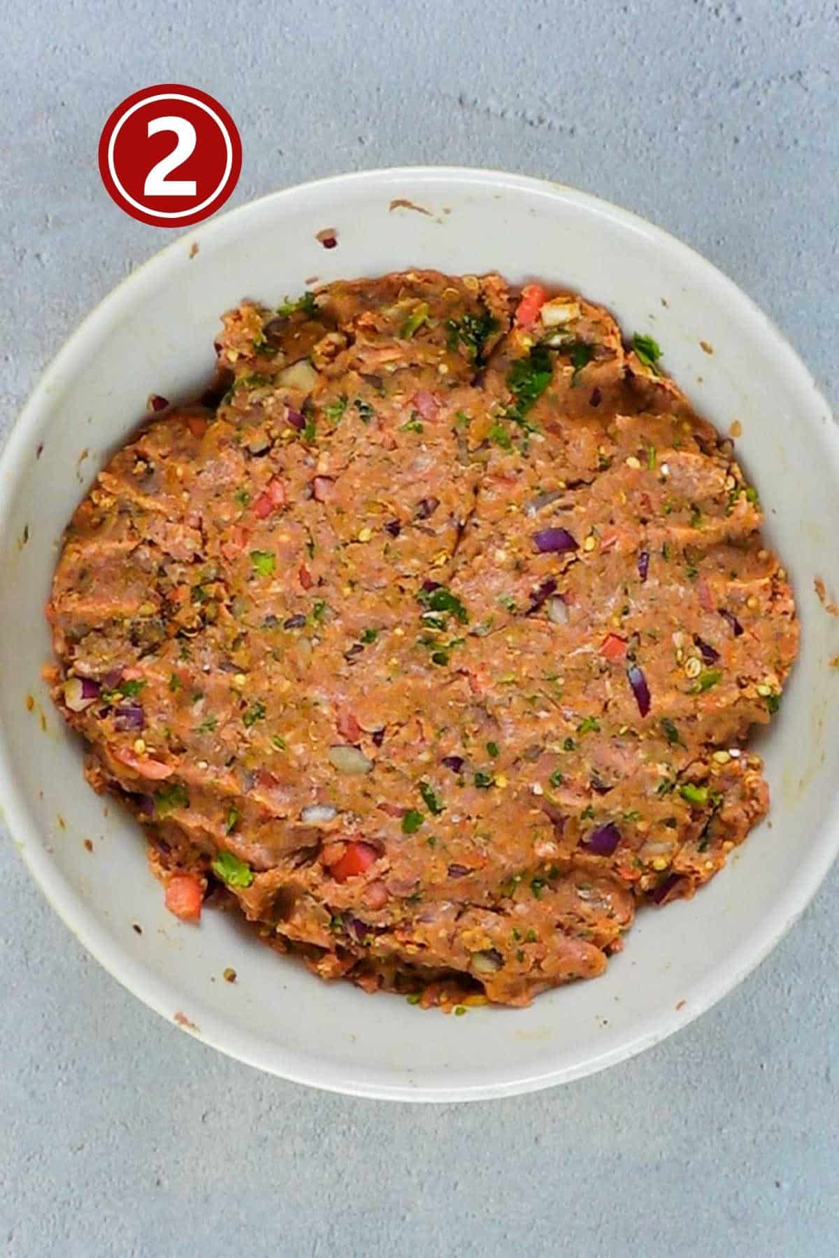 Kabab mixture in a large bowl ready to be marinated for 2 - 3 hours.