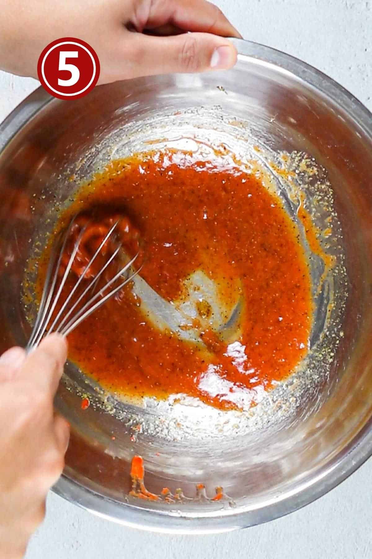 Preparing the lemon sauce in a large bowl.