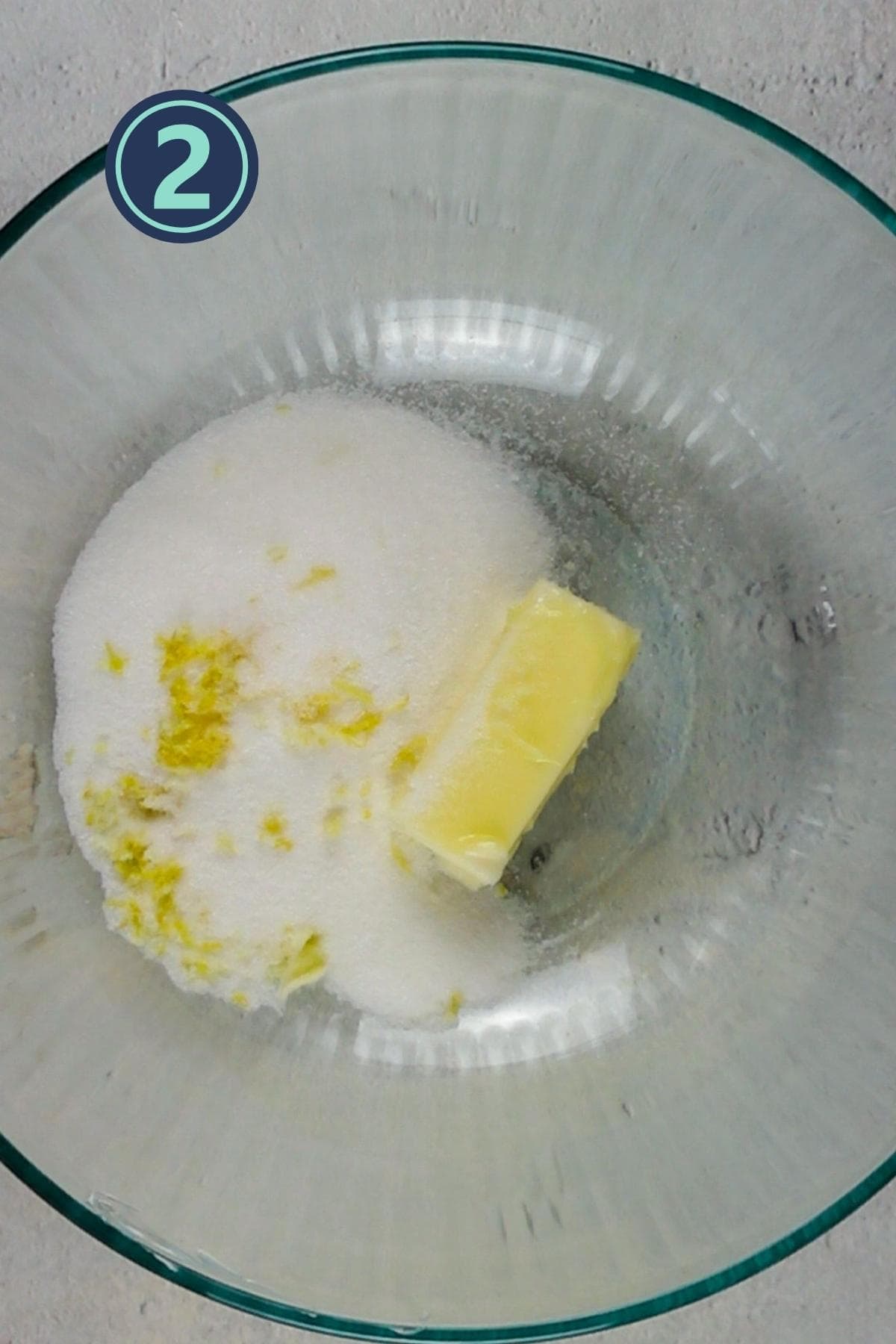 beating the butter, sugar and lemon zest together for the cake.