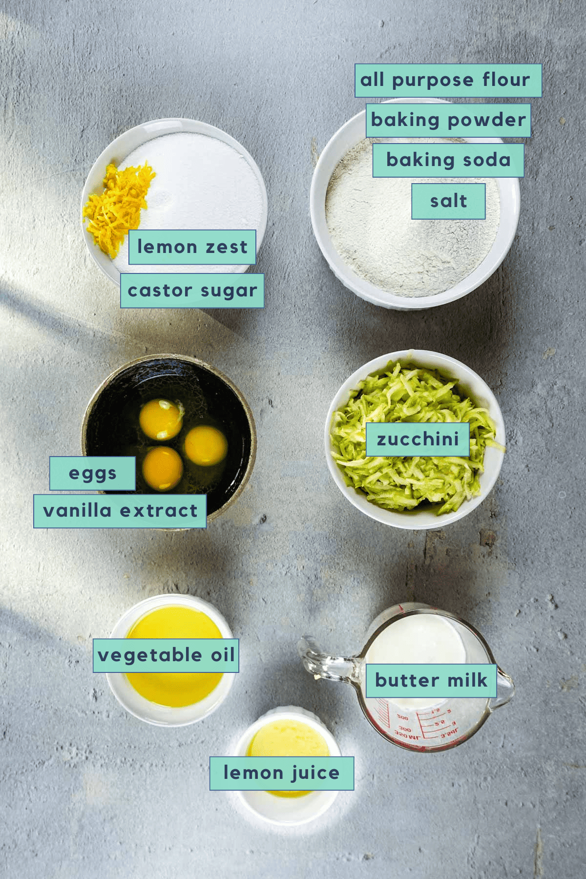 Ingredients for lemon zucchini bread sitting on the table.