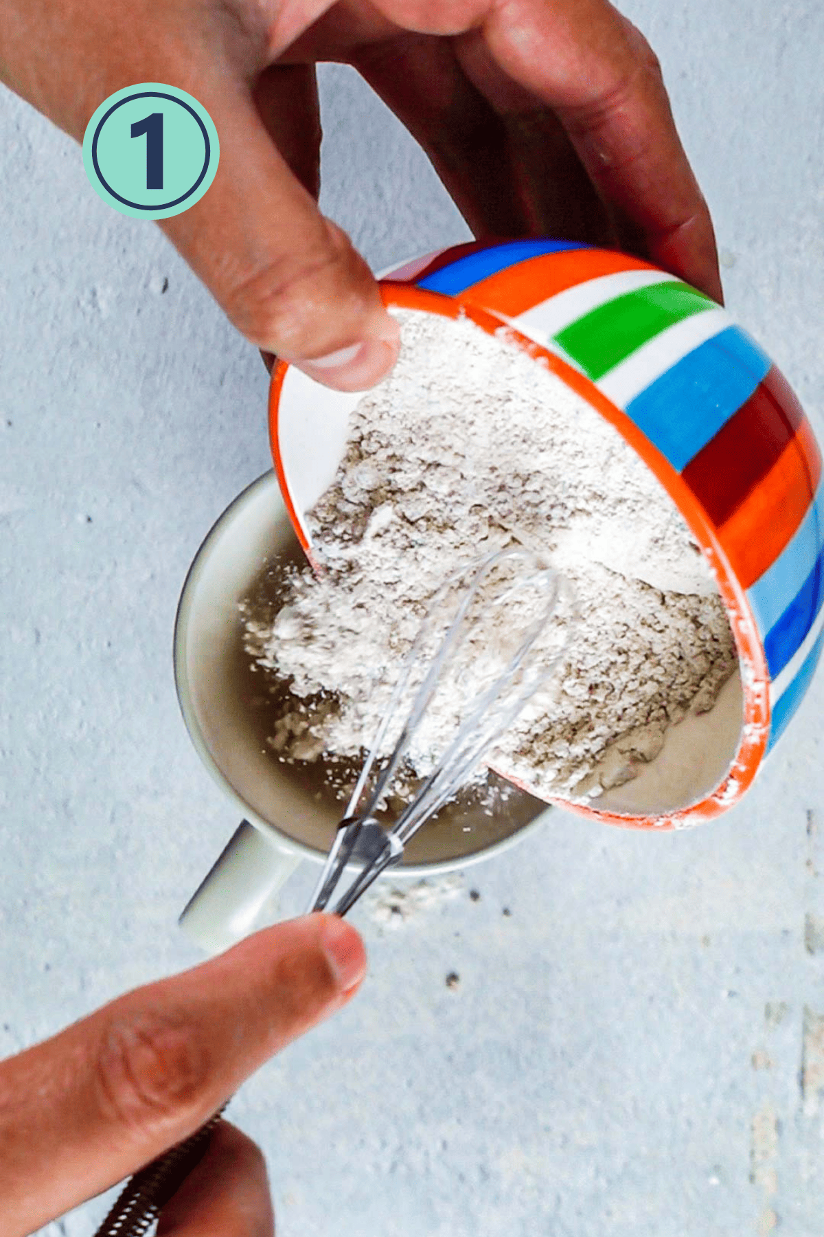 Whisking dry ingredients for the mug cake.