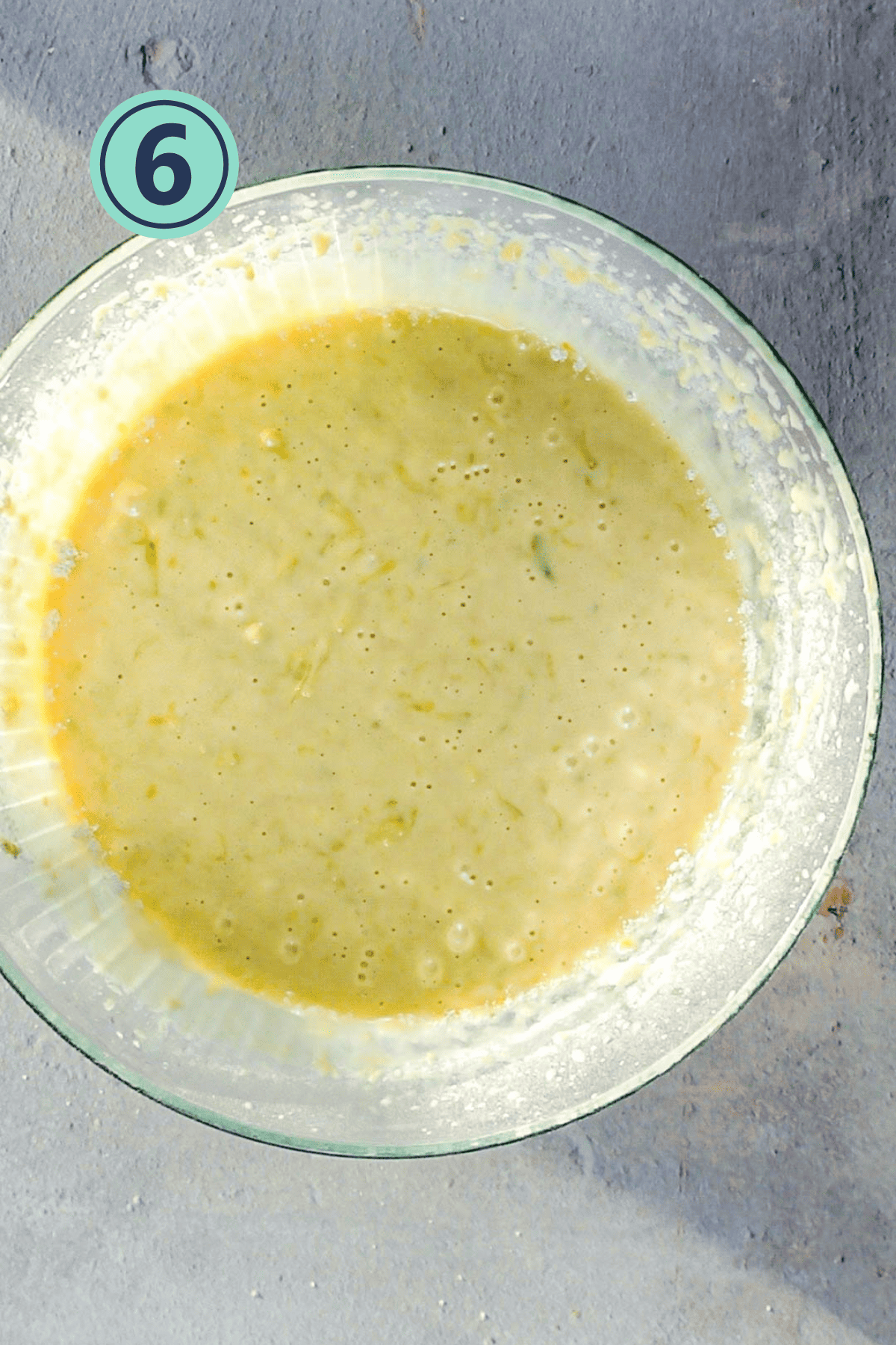 Batter for lemon bread in a large bowl.