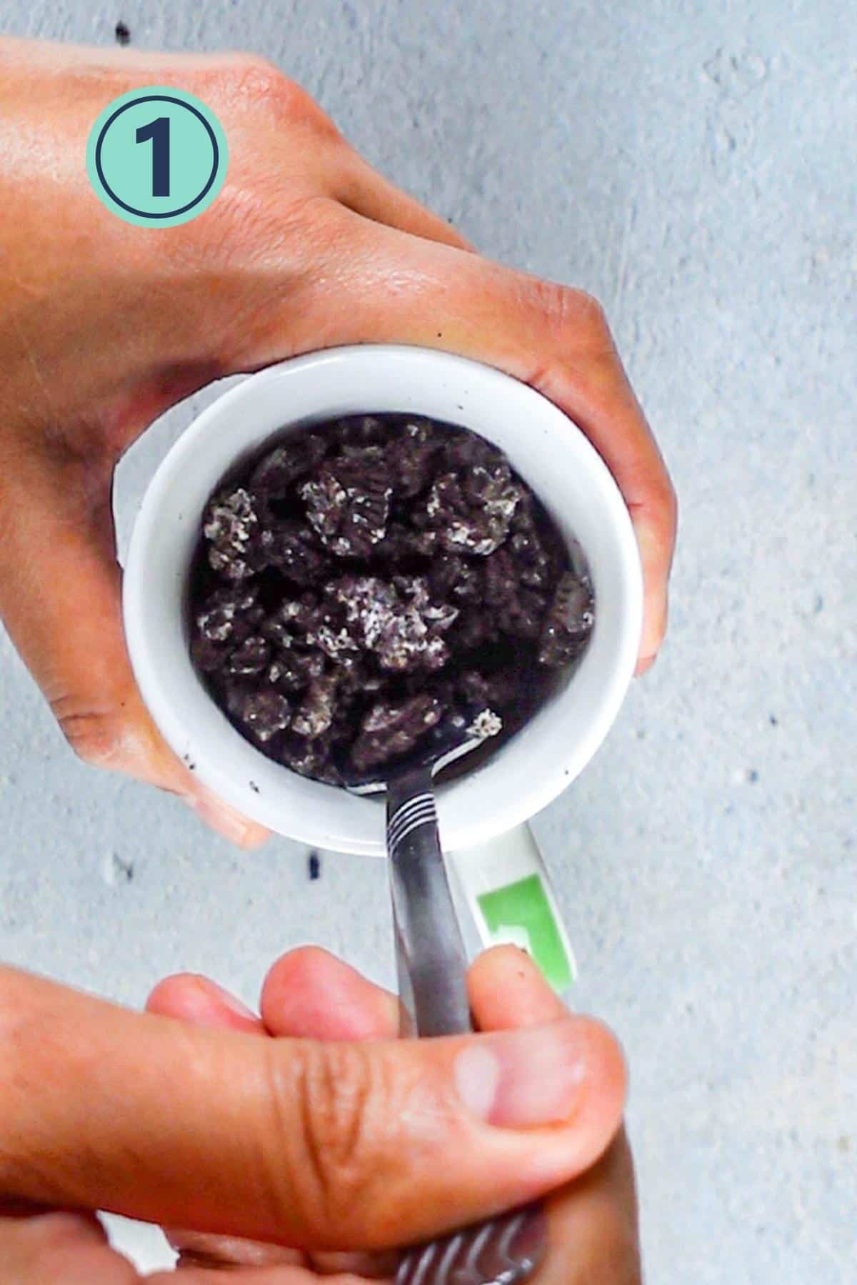 Crushed Oreo cookies in the glass.